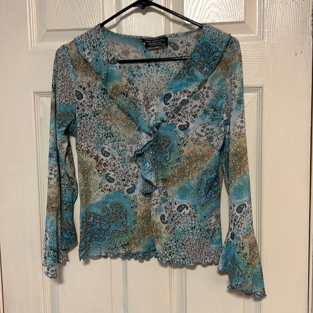Women ruffle front shirt in blue,cream, navy snd brown